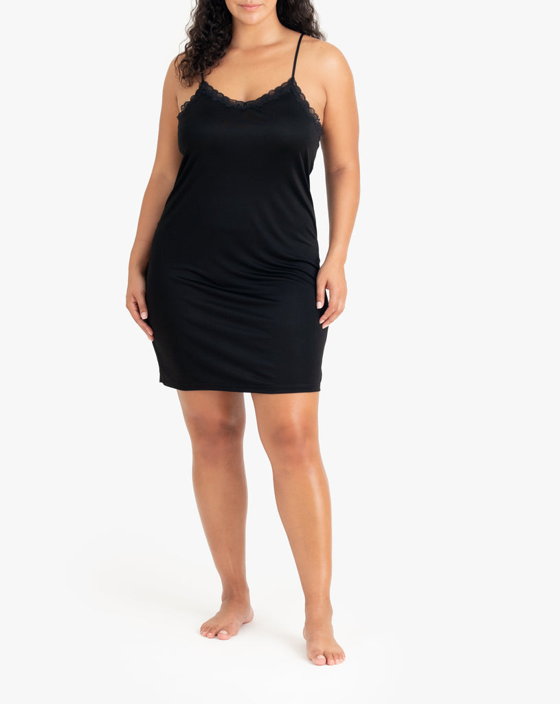 Model wearing Uwila Warrior Silk Blend Slip in Tap Shoe Black on White Background